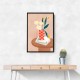 Flower With a Checkered Red Vase