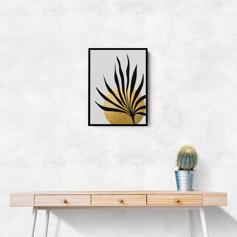 Tropical sun and palm leaf