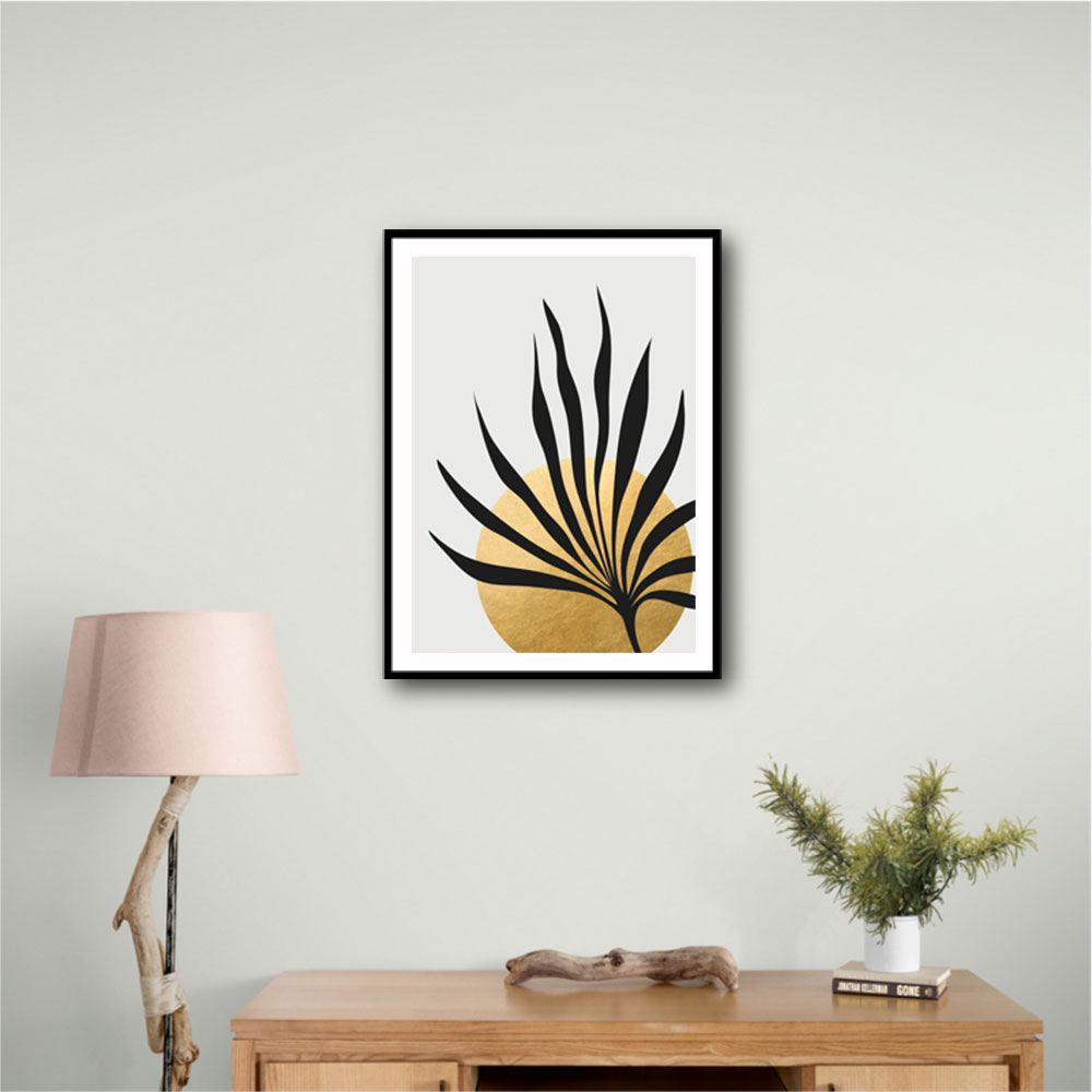 Tropical sun and palm leaf